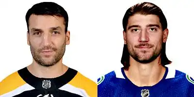 ៣) Patrice Bergeron ឬ Chris Tanev?